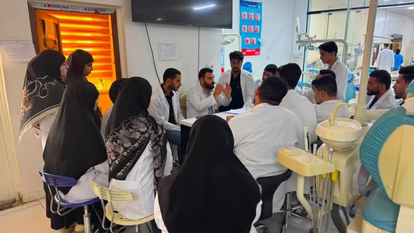 A panel discussion for dental students as part of the summer training programs in the Prosthodontics branch.